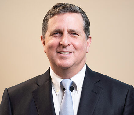 John A. Vukich, MD
